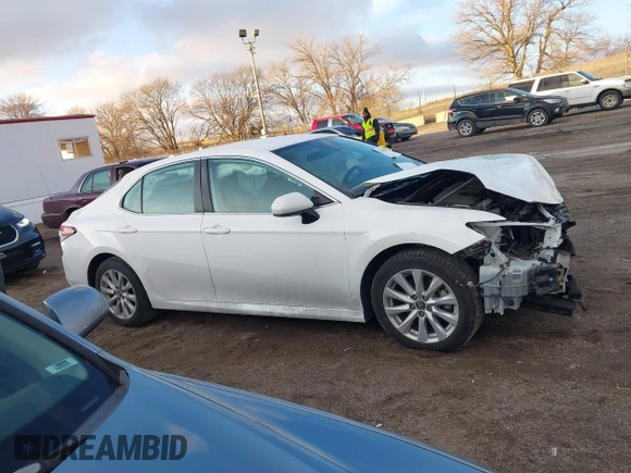2019 Toyota Camry LE z VIN 4T1B11HK1KU804266, wystawiony jako IAAI lot #41226403 z przebiegiem 91 163 mil mil oraz . Historia ofert i sprzedaży dostępna na DreamBid. Obrazek 14.