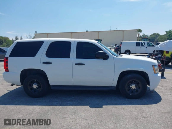 2011 Chevrolet Tahoe Commercial with VIN 1GNLC2E02BR325621, listed as a IAAI auction lot 41866389 with 167,693 mi miles and . Bid and sale history available at DreamBid. Image 13.