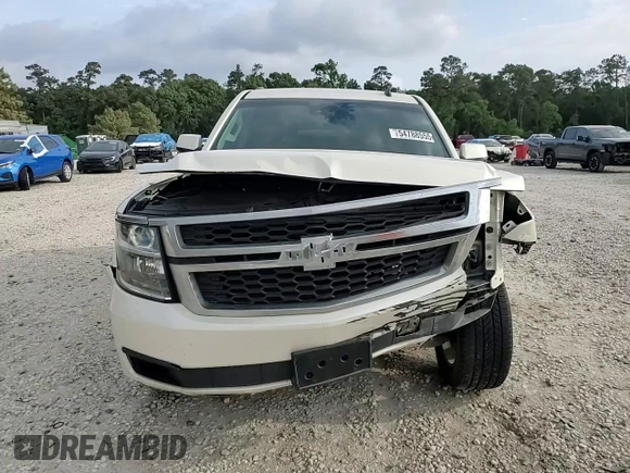 2015 Chevrolet Tahoe LT with VIN 1GNSCBKC9FR220574, listed as a Copart auction lot 54788555 with 244,491 mi miles and Salvage title. Bid and sale history available at DreamBid. Image 14.