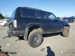 1996 Toyota Land Cruiser with VIN JT3HJ85J4T0136821, listed as a Copart auction lot 46988905 with 311,561 mi miles and Salvage Title. Bid and sale history available at carsss.com. Image 3.