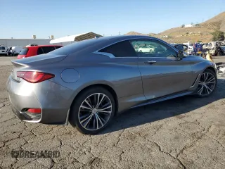 2018 Infiniti Q60 Luxe with VIN JN1EV7EL8JM390331, listed as a Copart auction lot 57862095 with 54,676 mi miles and Salvage title. Bid and sale history available at DreamBid. Image 3.