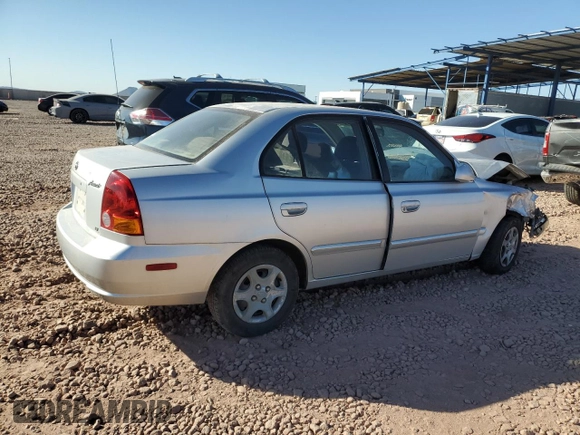 2003 Hyundai Accent GL with VIN KMHCG45CX3U429660, listed as a Copart auction lot 43824125 with 0 mi miles and Salvage Title. Bid and sale history available at carsss.com. Image 3.