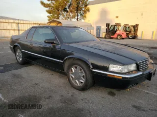 1999 Cadillac Eldorado ESC with VIN 1G6EL12Y8XU614645, listed as a Copart auction lot 86353754 with 151,243 mi miles and Clean Title. Bid and sale history available at DreamBid. Image 4.