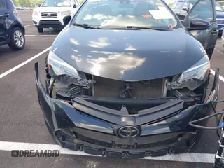 2019 Toyota Corolla L with VIN 5YFBURHE4KP860848, listed as a IAAI auction lot 42167529 with 152,301 mi miles. Bid and sale history available at carsss.com. Image 6.