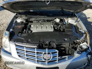 2009 Cadillac DTS 1SC z VIN 1G6KD57Y89U105190, wystawiony jako Copart lot #77560874 z przebiegiem 166 134 mil mil oraz Szkoda całkowita • Salvage title. Historia ofert i sprzedaży dostępna na DreamBid. Obrazek 11.