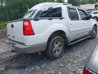 2004 Ford Explorer Sport Trac XLS z VIN 1FMZU67K44UA57074, wystawiony jako IAAI lot #42505321 z przebiegiem 282 904 mil mil oraz . Historia ofert i sprzedaży dostępna na DreamBid. Obrazek 4.