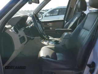 2016 Land Rover LR4 HSE Lux with VIN SALAK2V69GA792458, listed as a Copart auction lot 52592155 with 128,664 mi miles and Salvage Title. Bid and sale history available at DreamBid. Image 7.