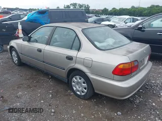 2000 Honda Civic LX z VIN 1HGEJ6675YL037812, wystawiony jako IAAI lot #42504129 z przebiegiem 72 001 mil mil oraz . Historia ofert i sprzedaży dostępna na DreamBid. Obrazek 3.