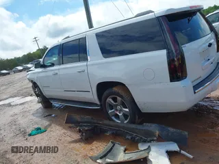 2017 Chevrolet Suburban Premier z VIN 1GNSCJKCXHR204770, wystawiony jako IAAI lot #42262898 z przebiegiem 166 304 mil mil oraz . Historia ofert i sprzedaży dostępna na DreamBid. Obrazek 14.