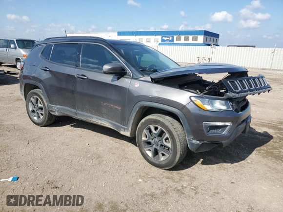 2018 Jeep Compass Trailhawk with VIN 3C4NJDDB0JT458339, listed as a Copart auction lot 58834155 with 103,811 mi miles and Salvage title. Bid and sale history available at DreamBid. Image 4.