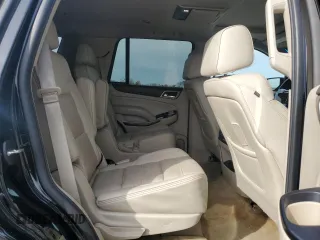 2015 GMC Yukon Denali with VIN 1GKS1CKJ1FR303049, listed as a Copart auction lot 82435514 with 100,693 mi miles and Salvage Title. Bid and sale history available at carsss.com. Image 12.