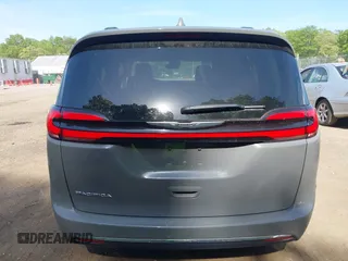 2022 Chrysler Pacifica Touring L with VIN 2C4RC1BG3NR168565, listed as a IAAI auction lot 42150290 with 61,750 mi miles and . Bid and sale history available at DreamBid. Image 16.
