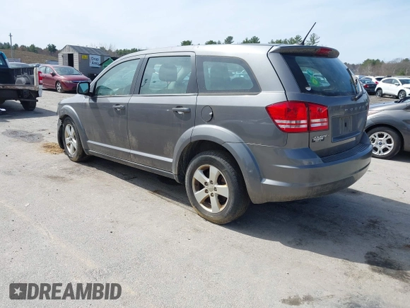 2013 Dodge Journey SE Plus with VIN 3C4PDCAB9DT582144, listed as a IAAI auction lot 41964828 with 171,398 mi miles and . Bid and sale history available at DreamBid. Image 3.