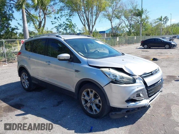 2016 Ford Escape Titanium with VIN 1FMCU0JX2GUC39416, listed as a IAAI auction lot 41793375 with 146,877 mi miles. Bid and sale history available at carsss.com. Image 1.