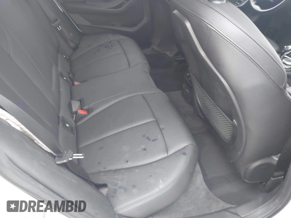 2021 BMW 2 Series 228i with VIN WBA53AK01M7J12347, listed as a IAAI auction lot 42432565 with 52,559 mi miles and . Bid and sale history available at DreamBid. Image 8.
