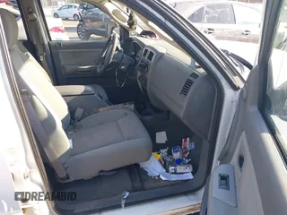2007 Dodge Dakota SLT z VIN 1D7HW48JX7S166780, wystawiony jako IAAI lot #41375942 z przebiegiem 148 778 mil mil oraz . Historia ofert i sprzedaży dostępna na DreamBid. Obrazek 5.