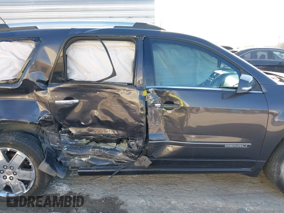 2016 GMC Acadia Denali with VIN 1GKKRTKD5GJ206889, listed as a IAAI auction lot 41258372 with 113,223 mi miles. Bid and sale history available at carsss.com. Image 13.