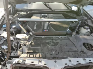 2022 BMW X4 M z VIN 5YM23EC00N9L35827, wystawiony jako Copart lot #87932635 z przebiegiem Nie podano mil oraz Szkoda całkowita • Salvage title. Historia ofert i sprzedaży dostępna na DreamBid. Obrazek 13.