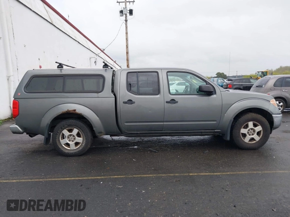2007 Nissan Frontier SE with VIN 1N6AD09W17C408755, listed as a IAAI auction lot 41958819 with 218,530 mi miles. Bid and sale history available at carsss.com. Image 13.
