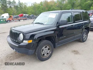 2014 Jeep Patriot Sport with VIN 1C4NJRBB3ED879757, listed as a IAAI auction lot 42241511 with 126,135 mi miles and . Bid and sale history available at carsss.com. Image 2.