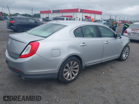 2013 Lincoln MKS с VIN 1LNHL9DK3DG604712, выставлен на аукционе IAAI как лот 42351237 с пробегом 144 927 миль миль и . История ставок и продаж доступна на DreamBid. Изображение 4.