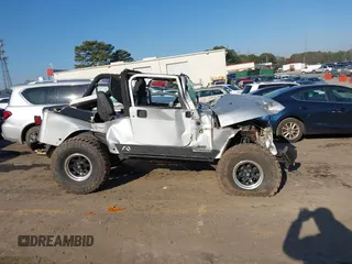 2006 Jeep Wrangler Unlimited LWB with VIN 1J4FA44S76P755148, listed as a IAAI auction lot 41774840 with 167,914 mi miles. Bid and sale history available at carsss.com. Image 13.