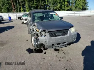 2005 Ford Escape XLT with VIN 1FMCU93105KA96729, listed as a Copart auction lot 75553354 with 220,081 mi miles and Salvage Title. Bid and sale history available at DreamBid. Image 12.