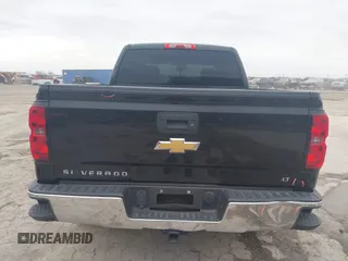 2015 Chevrolet Silverado 1500 LT with VIN 3GCPCREC0FG412551, listed as a IAAI auction lot 41577706 with 156,318 mi miles and . Bid and sale history available at DreamBid. Image 17.