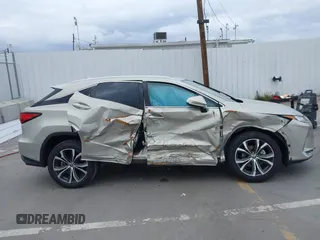 2020 Lexus RX with VIN 2T2HZMAA0LC166189, listed as a IAAI auction lot 41778489 with 49,408 mi miles. Bid and sale history available at carsss.com. Image 13.
