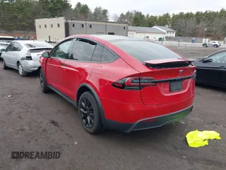 2022 Tesla Model X with VIN 7SAXCBE57NF354843, listed as a IAAI auction lot 41027188 with Not Provided miles and . Bid and sale history available at DreamBid. Image 3.