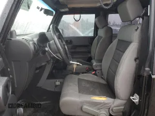2008 Jeep Wrangler X z VIN 1J8FA24168L646281, wystawiony jako Copart lot #57689895 z przebiegiem 205 348 mil mil oraz Szkoda całkowita • Salvage title. Historia ofert i sprzedaży dostępna na DreamBid. Obrazek 7.
