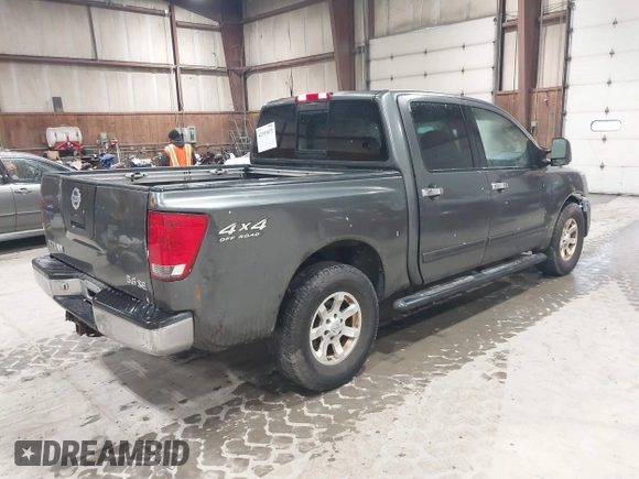 2004 Nissan Titan LE with VIN 1N6AA07B84N544745, listed as a IAAI auction lot 42195072 with 357,986 mi miles. Bid and sale history available at carsss.com. Image 4.
