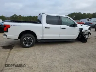 2023 Ford F-150 Lightning Pro z VIN 1FTVW1ELXPWG63466, wystawiony jako Copart lot #43397005 z przebiegiem 8 852 mil mil oraz Szkoda całkowita • Salvage title. Historia ofert i sprzedaży dostępna na DreamBid. Obrazek 3.