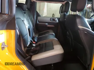 2022 Ford Bronco z VIN 1FMEE5DP6NLA78473, wystawiony jako Copart lot #60377125 z przebiegiem 36 566 mil mil oraz Szkoda całkowita • Salvage title. Historia ofert i sprzedaży dostępna na DreamBid. Obrazek 11.