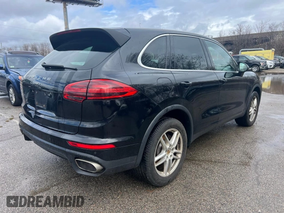 2016 Porsche Cayenne with VIN WP1AA2A26GKA13040, listed as a Copart auction lot 52623935 with 87,594 mi miles and Clean Title. Bid and sale history available at carsss.com. Image 3.