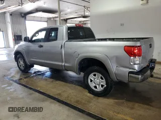 2010 Toyota Tundra с VIN 5TFUM5F11AX006417, выставлен на аукционе Copart как лот 55897725 с пробегом 203 892 миль миль и Списание • Salvage title. История ставок и продаж доступна на DreamBid. Изображение 2.