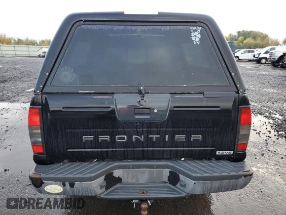 2002 Nissan Frontier XE with VIN 1N6ED26Y52C361595, listed as a Copart auction lot 77796414 with 170,555 mi miles and Salvage title. Bid and sale history available at DreamBid. Image 6.