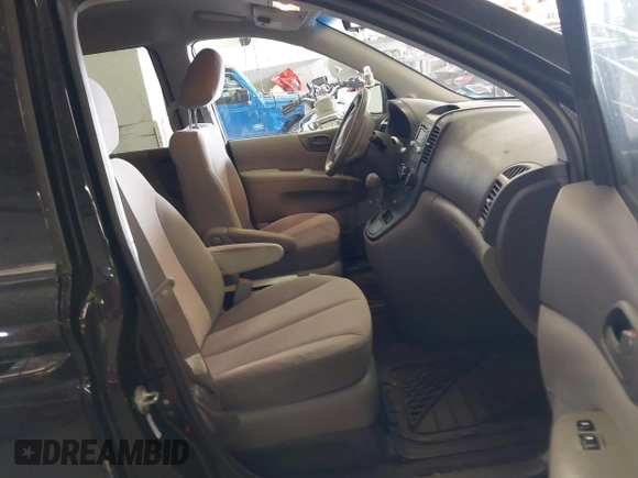 2012 Kia Sedona LX with VIN KNDMG4C78C6435430, listed as a IAAI auction lot 41701890 with 170,128 mi miles. Bid and sale history available at carsss.com. Image 5.