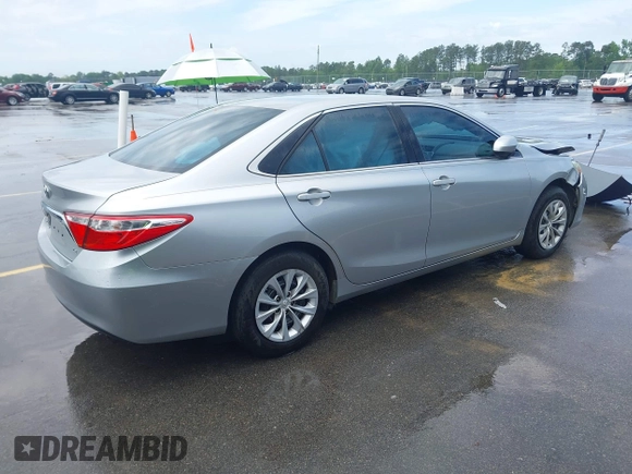 2015 Toyota Camry XLE with VIN 4T4BF1FK4FR483890, listed as a IAAI auction lot 42088503 with 189,058 mi miles and . Bid and sale history available at DreamBid. Image 4.