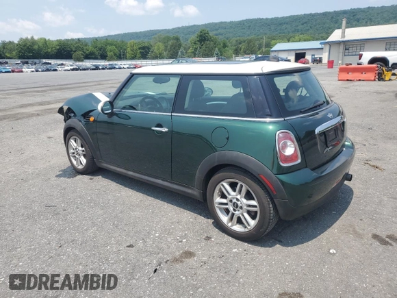 2011 MINI Hardtop with VIN WMWSU3C51BTX95581, listed as a Copart auction lot 60443995 with 157,213 mi miles and Salvage title. Bid and sale history available at DreamBid. Image 2.