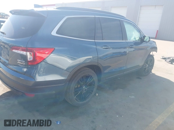 2021 Honda Pilot Special Edition with VIN 5FNYF6H2XMB024677, listed as a IAAI auction lot 41748498 with 42,249 mi miles and . Bid and sale history available at DreamBid. Image 4.