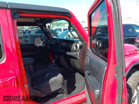 2019 Jeep Wrangler Unlimited Sahara with VIN 1C4HJXEG7KW551864, listed as a IAAI auction lot 42170875 with 115,695 mi miles and . Bid and sale history available at DreamBid. Image 5.