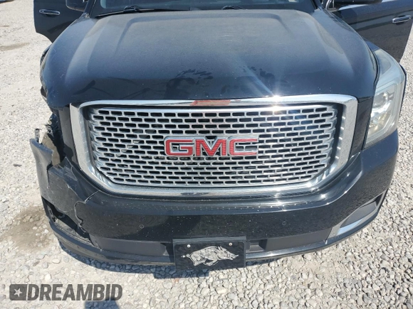 2015 GMC Yukon Denali z VIN 1GKS2CKJ8FR132636, wystawiony jako Copart lot #53567045 z przebiegiem 148 997 mil mil oraz Szkoda całkowita • Salvage title. Historia ofert i sprzedaży dostępna na DreamBid. Obrazek 13.