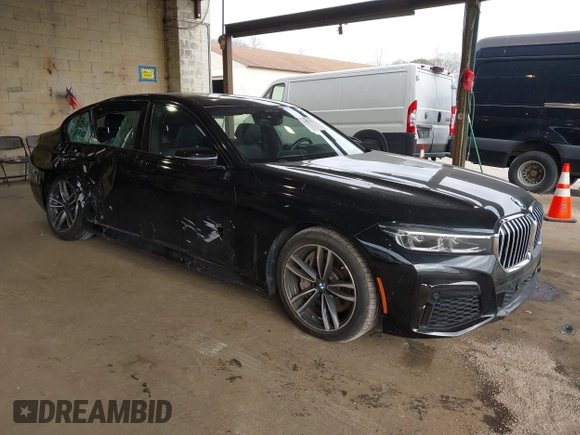2020 BMW 7 Series 750i xDrive with VIN WBA7U2C02LGJ59475, listed as a IAAI auction lot 41975021 with 52,818 mi miles and . Bid and sale history available at carsss.com. Image 1.