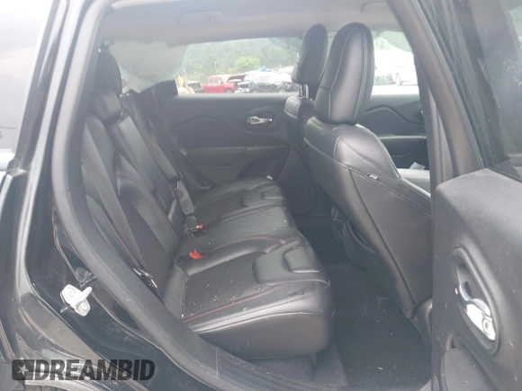 2021 Jeep Cherokee Trailhawk with VIN 1C4PJMBX0MD167941, listed as a IAAI auction lot 42507379 with 70,414 mi miles and . Bid and sale history available at DreamBid. Image 8.