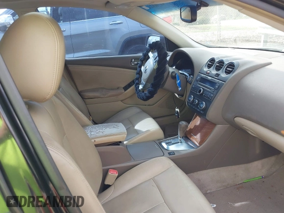 2008 Nissan Altima 3.5 SE with VIN 1N4BL21E98N404036, listed as a IAAI auction lot 41703232 with 284,553 mi miles. Bid and sale history available at carsss.com. Image 5.