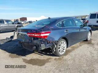 2015 Toyota Avalon Limited with VIN 4T1BK1EB0FU150769, listed as a IAAI auction lot 41297083 with 111,440 mi miles and . Bid and sale history available at DreamBid. Image 4.