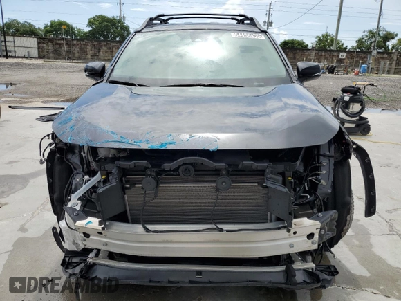 2024 Toyota RAV4 Hybrid LE with VIN 2T3UWRFV3RW204615, listed as a Copart auction lot 64436455 with 8,710 mi miles and Clean title. Bid and sale history available at DreamBid. Image 5.