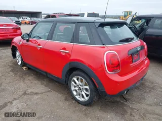 2019 MINI Hardtop 4 Door Cooper with VIN WMWXU1C58K2J02294, listed as a IAAI auction lot 41910654 with 97,887 mi miles. Bid and sale history available at carsss.com. Image 3.