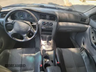 2005 Subaru Baja Turbo z VIN 4S4BT63C555106989, wystawiony jako Copart lot #57712695 z przebiegiem 209 779 mil mil oraz Tytuł czysty. Historia ofert i sprzedaży dostępna na DreamBid. Obrazek 9.